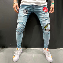 Load image into Gallery viewer, Ripped embroidered jeans
